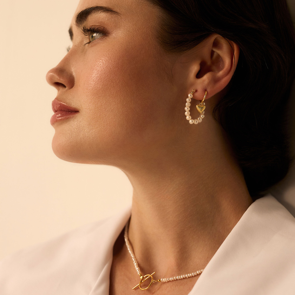 Złote kolczyki z sercami Amour 