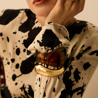 Złota sztywna bransoletka Bold N°2