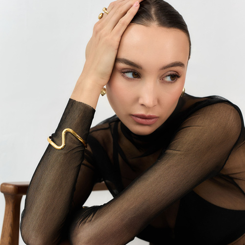 Złota sztywna bransoletka Fala