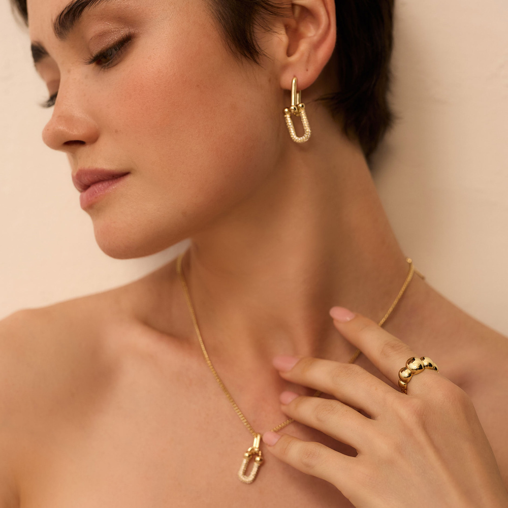 Złote kolczyki z ogniwami Cella 