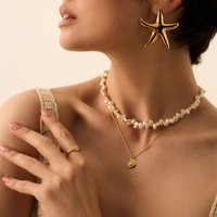 Złoty pierścionek z białym agatem La Mer