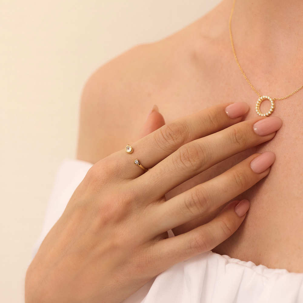 Złoty pierścionek z cyrkoniami Libra