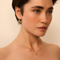 Złote kolczyki z ogniwami Cella 