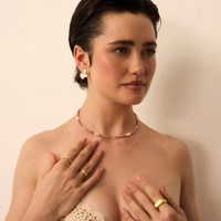 Złote kolczyki z białą emalią Art