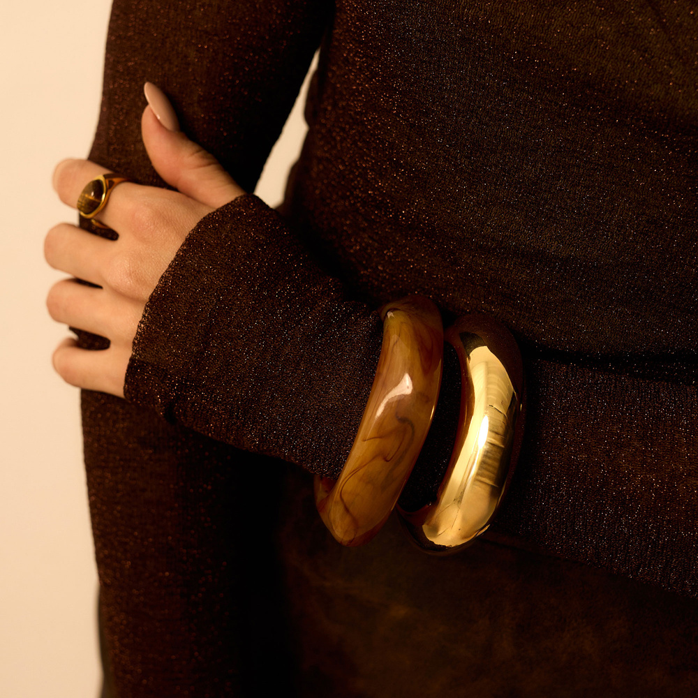 Złota sztywna bransoletka Bold