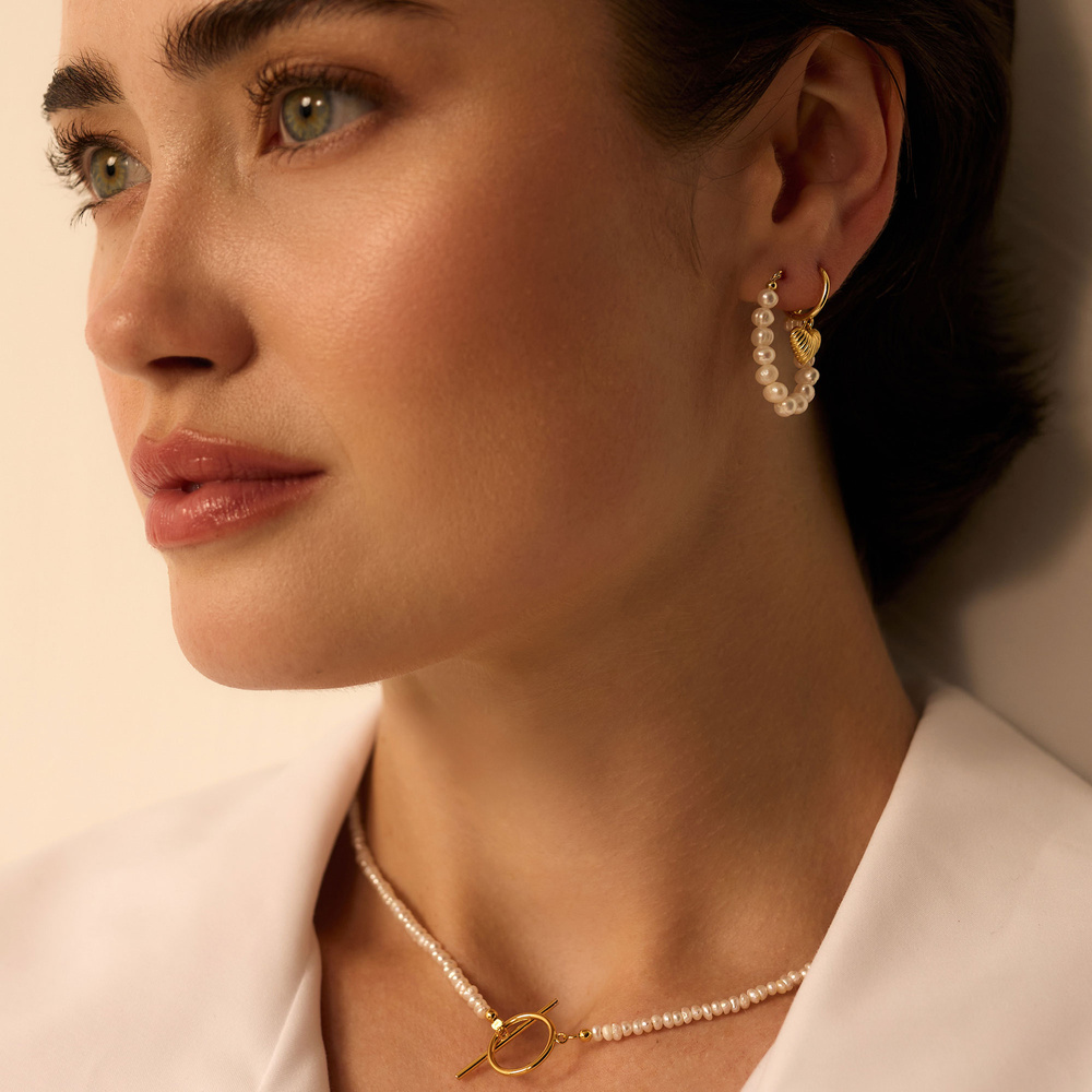 Złote kolczyki z sercami Amour 