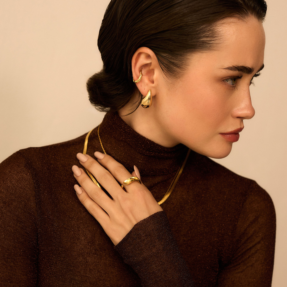 Złota nausznica Tail