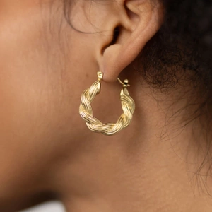 Złote skręcane kolczyki koła